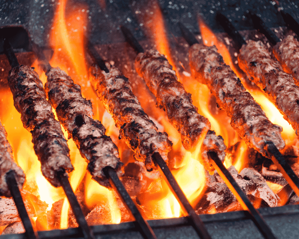 Charcoal-grilled meat skewers at Les Grillades Lebanese restaurant Ottawa, available for Uber Eats delivery